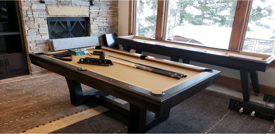 pool table and shuffle board in game room