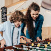 kids playing foosball