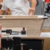 Craftsmen building a quality pool table frame in a nice clean shop